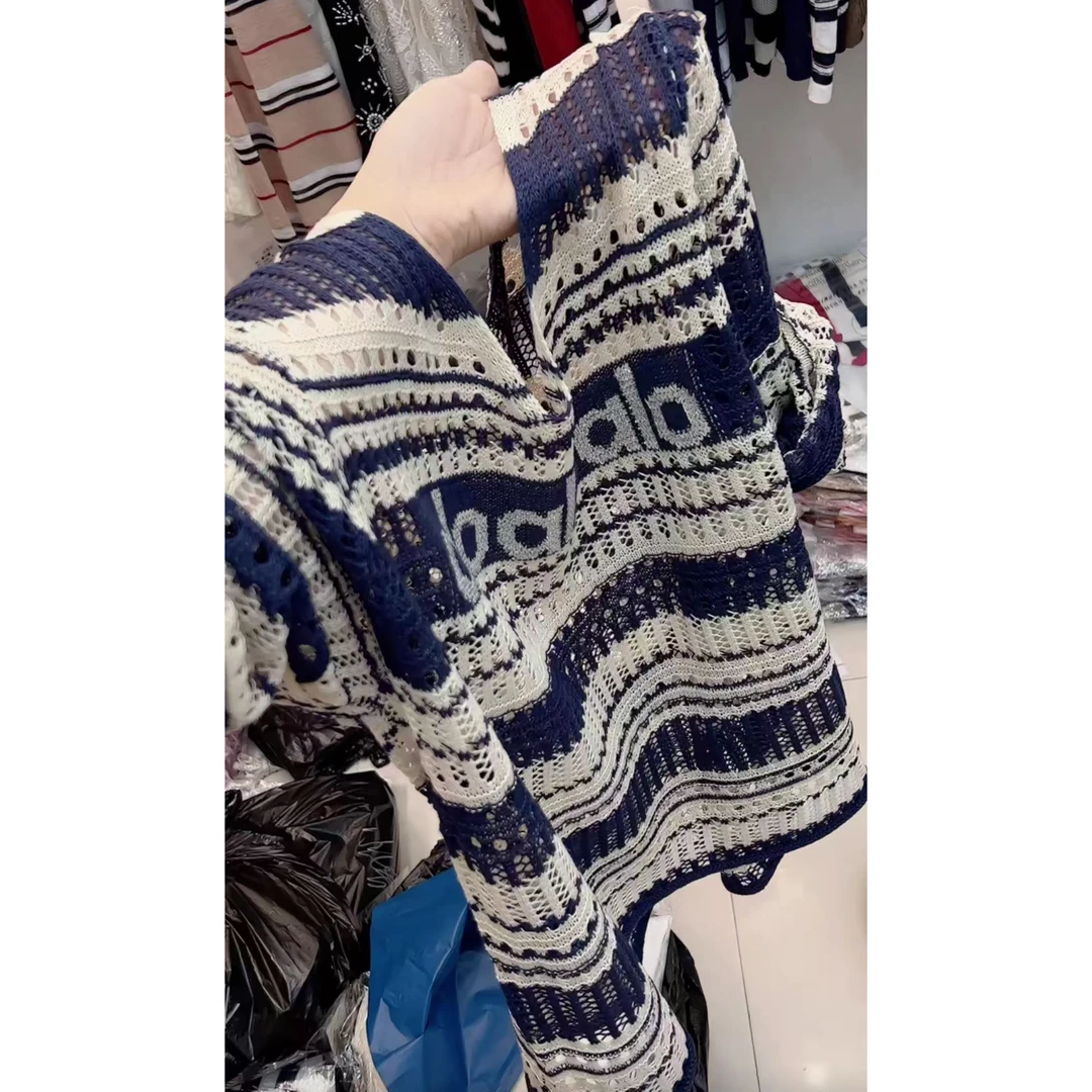 今年流行穿搭2025早秋新款温柔风镂空毛针织衫休闲风重工长袖上衣