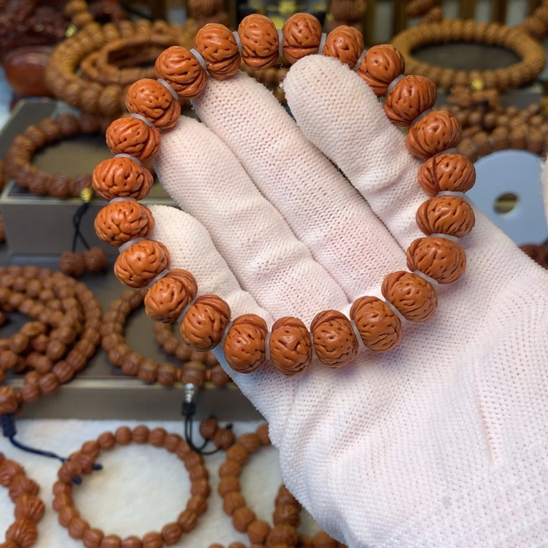 叶***凡桃核手串秦岭龙纹