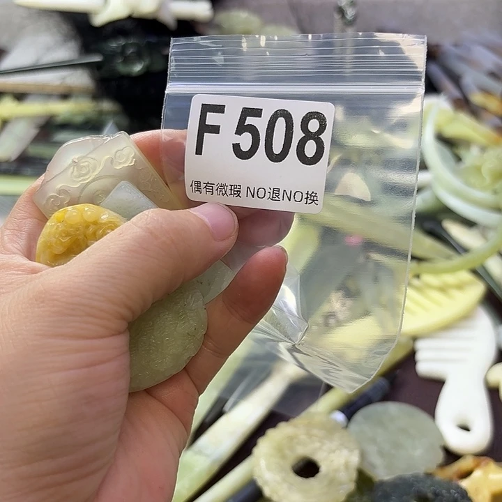 辛***婷合金蛇纹石玉发饰
