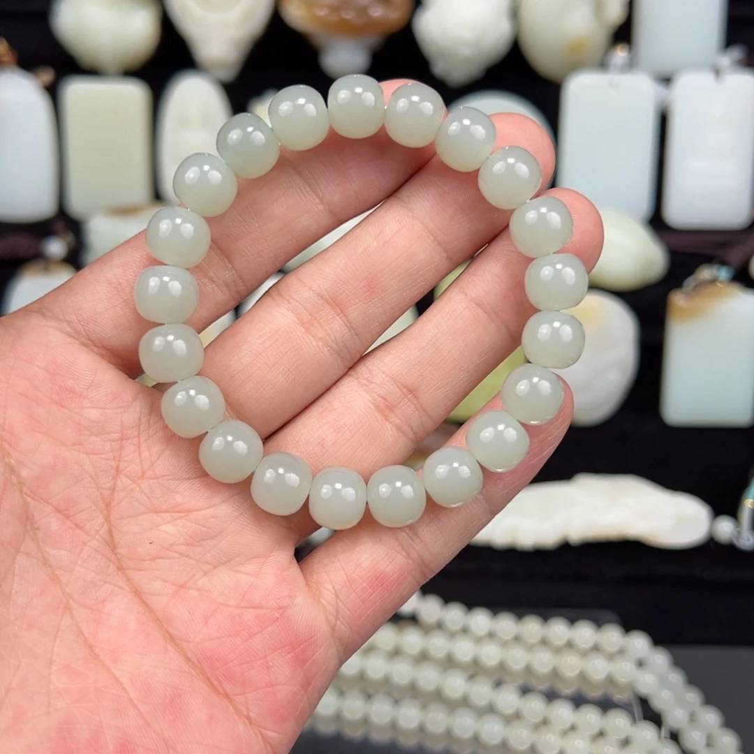 周***生和田玉未镶嵌手链