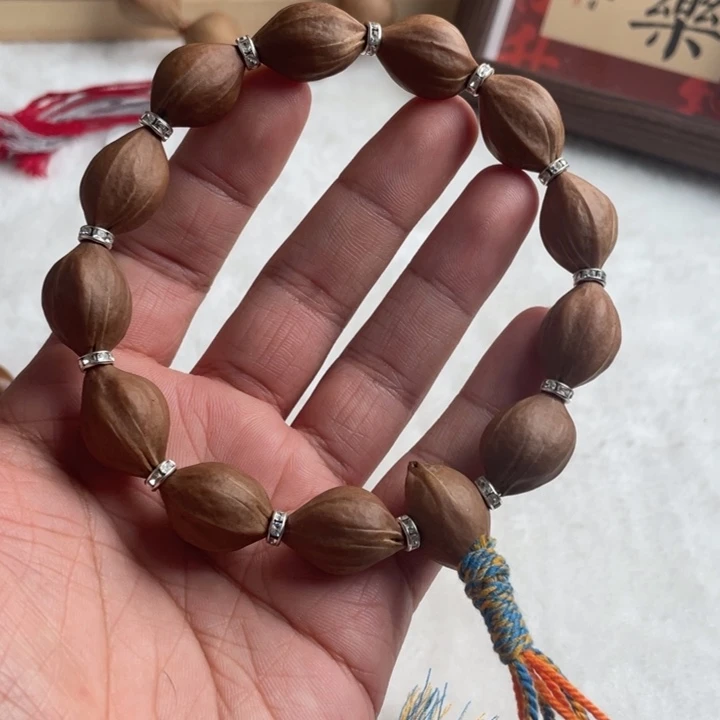 橄榄核吊坠橄榄手持