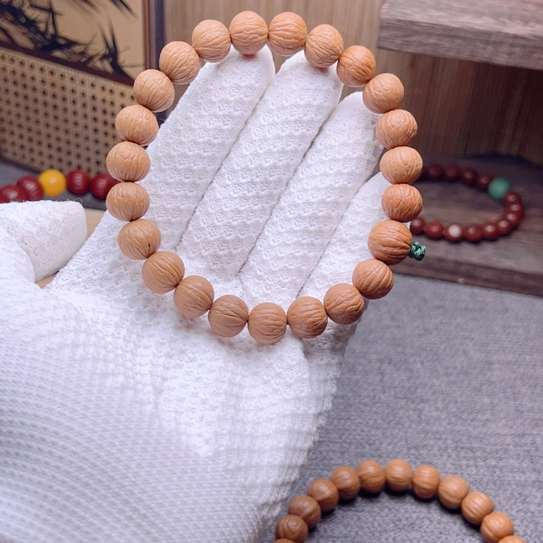 倪***猴头核桃手串12凤羽