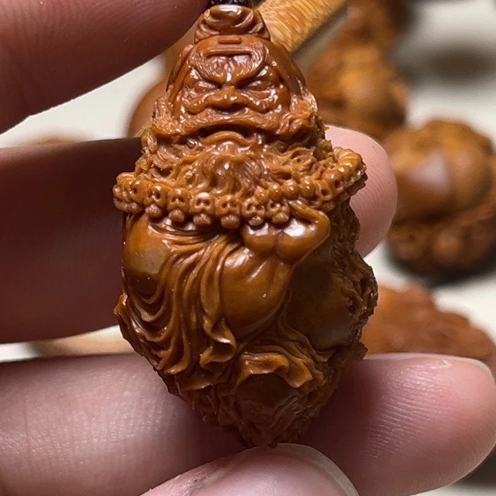 夕***下橄榄核手串默然钟馗