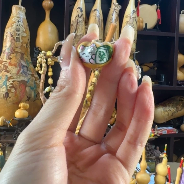 可打孔钱袋發招财猫