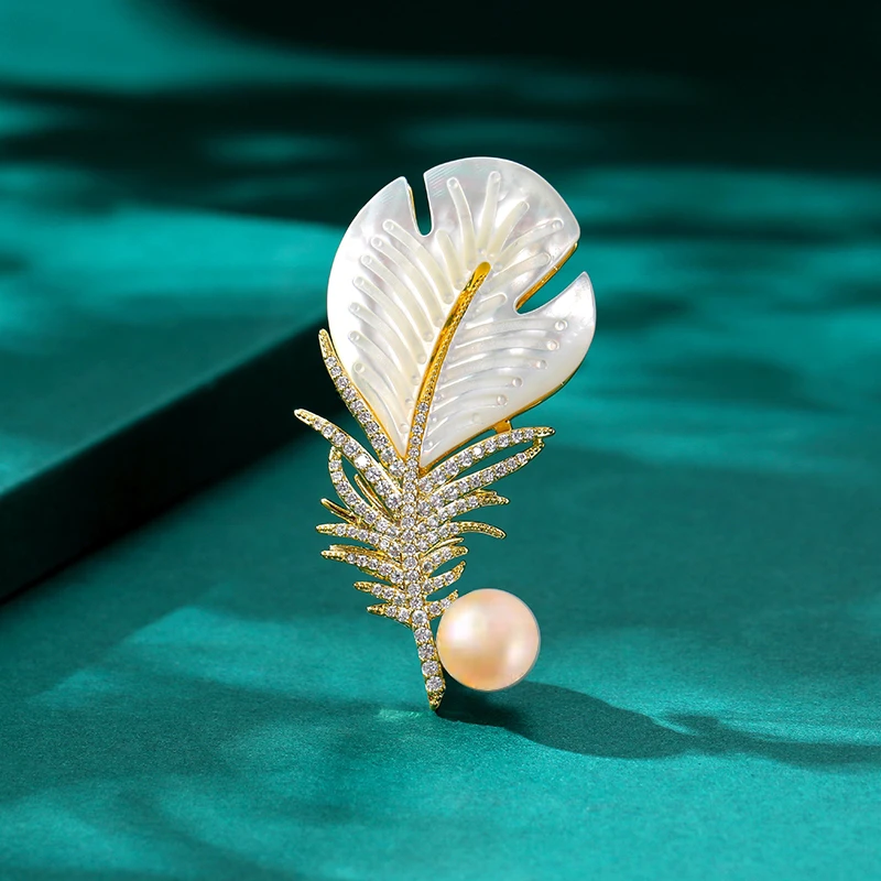 沐银时代羽毛8mm淡水珍珠香槟色胸针多样性发其一