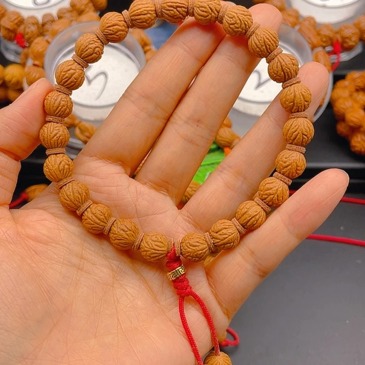 用***8吊坠桃核见健健康康平平安安9