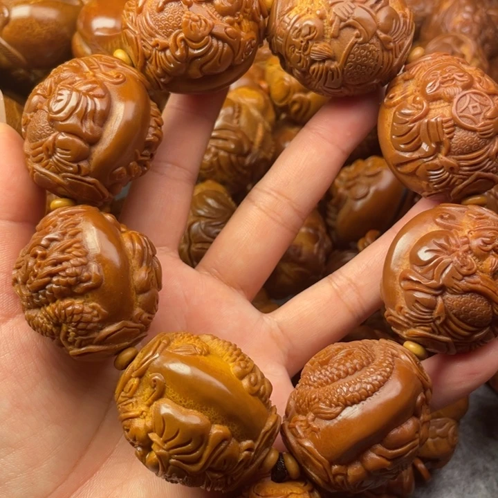 奇***影橄榄核吊坠橄榄核手持