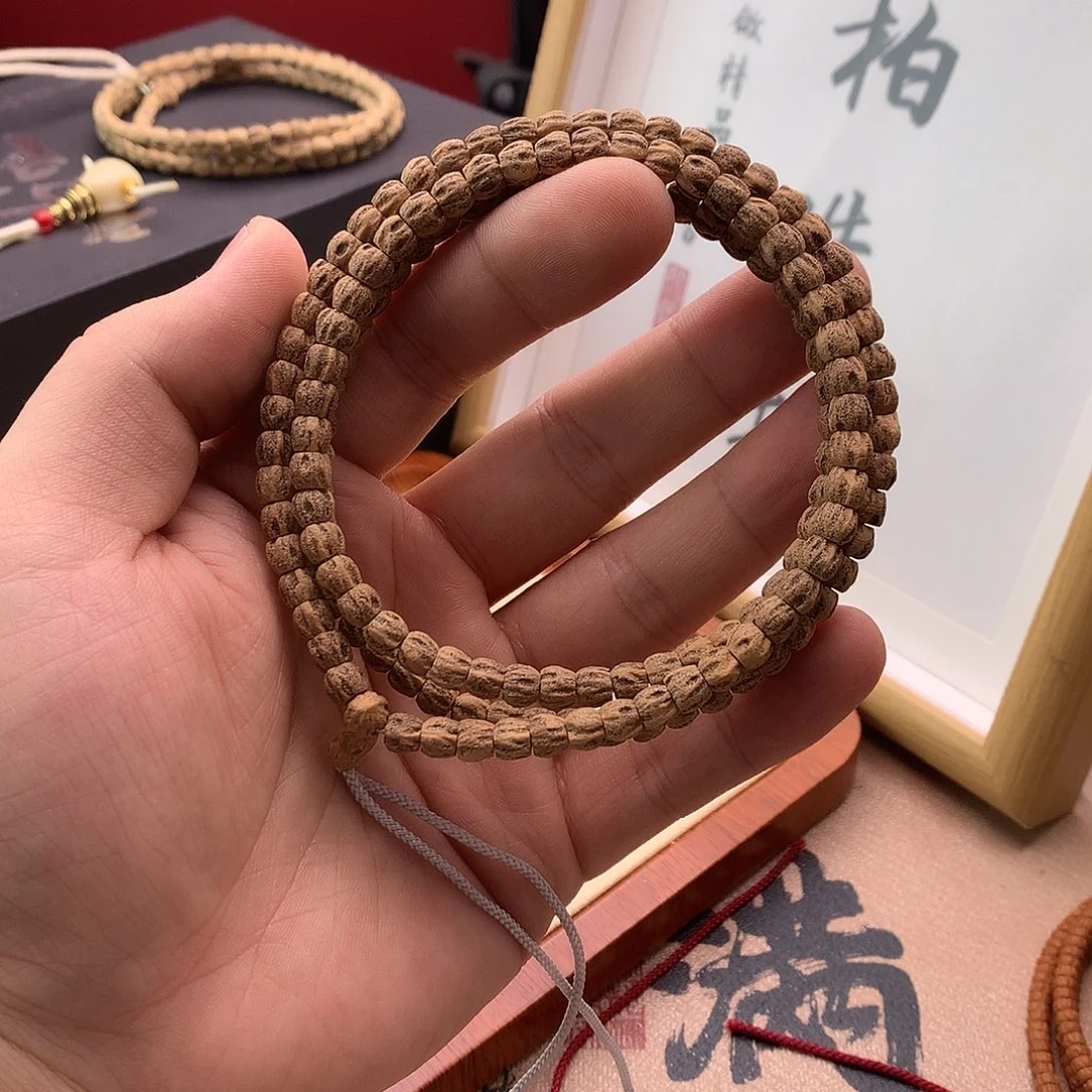柏香籽/百香籽吊坠莲花鬼脸