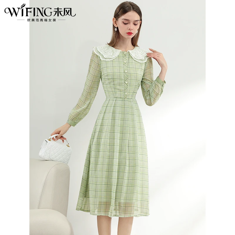 绿色雪纺格子连衣裙2025秋装新款气质时尚娃娃领长款裙子