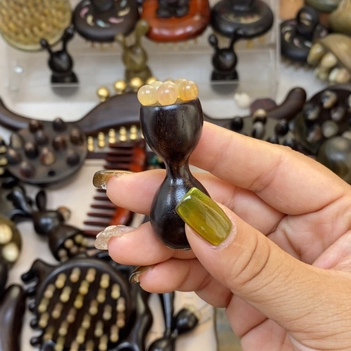紫光檀绕指柔羊角