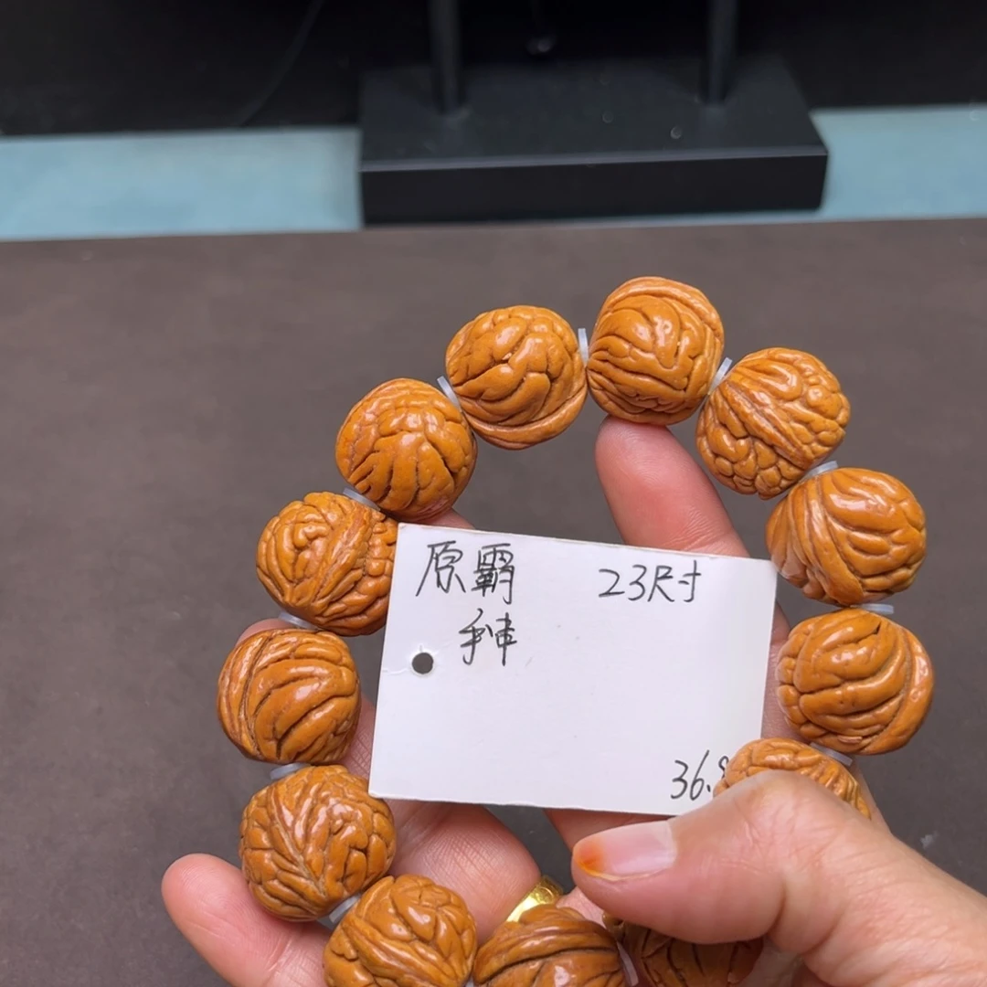 桃核吊坠原霸王龙手串