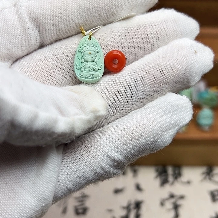 又***又南红玛瑙未镶嵌颈饰观音宝宝