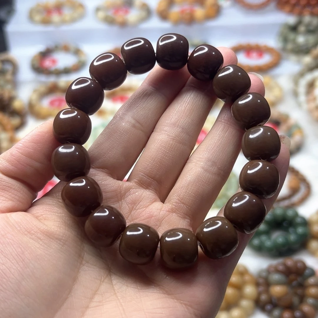 菩提根/象牙果手串毛****～黑金桶