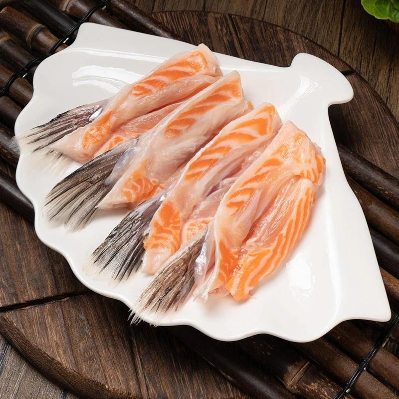 新鲜1kg冷冻三文鱼鳍边角料可用于烧烤炖汤等多种烹饪方式