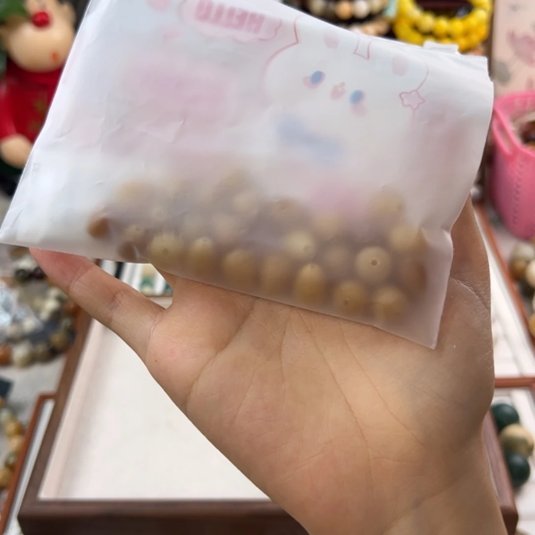 菩提根/象牙果手串晴****n卡12散珠黄色