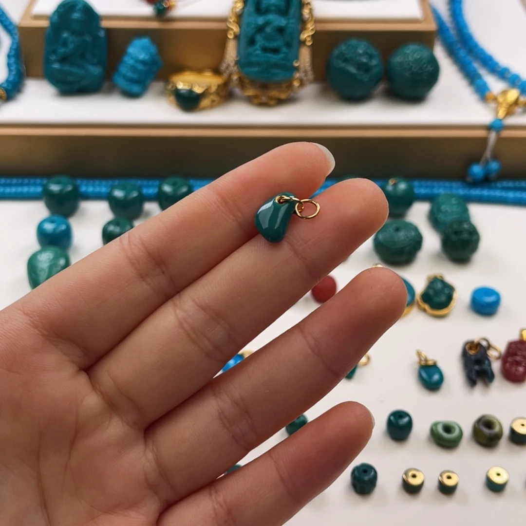 我***了绿松石未镶嵌把件