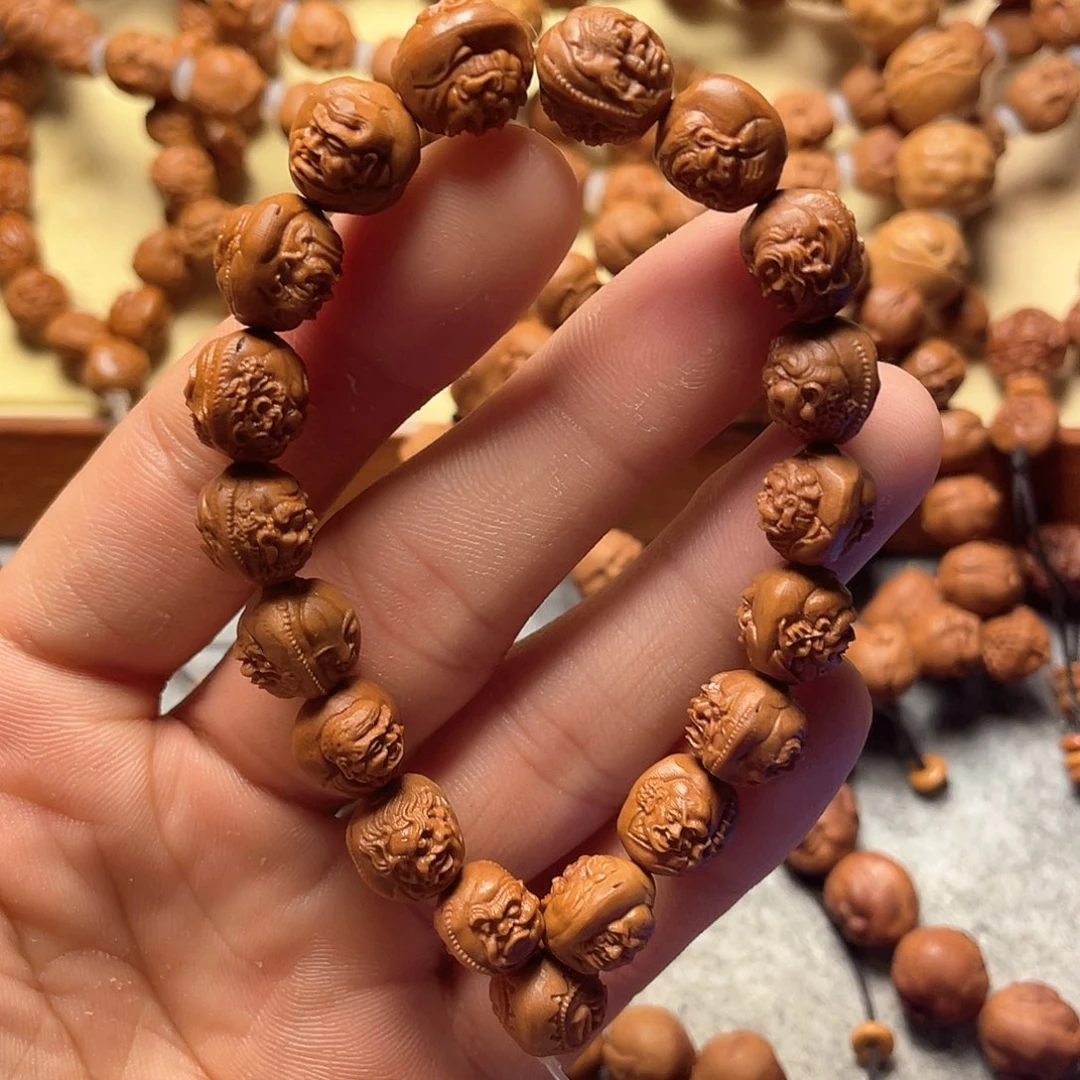 龙纹桃核雕刻双面36罗汉三丰罗汉