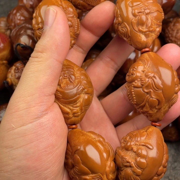 A***笑橄榄核吊坠橄榄核