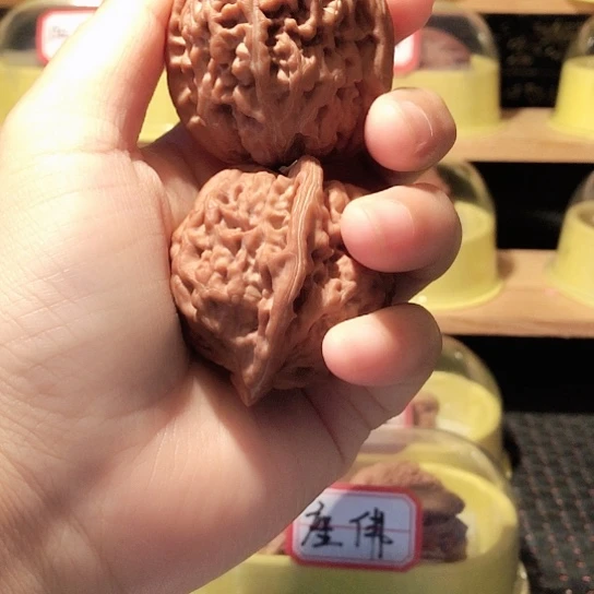 嗨****播文玩核桃把件凤凰台