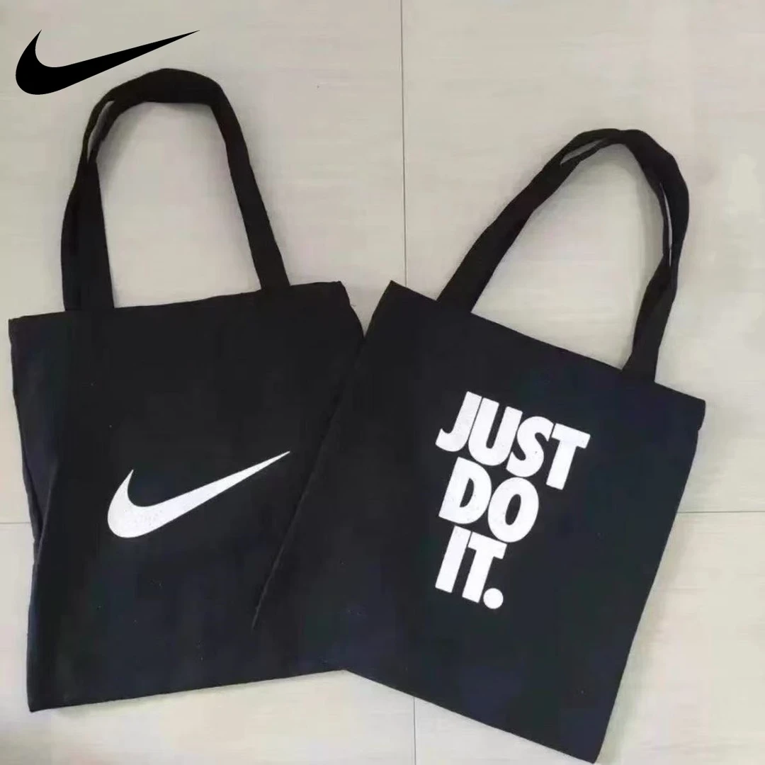 NIKE耐克斜跨百搭黑色手提包黑白简约ins帆布袋托特单肩包