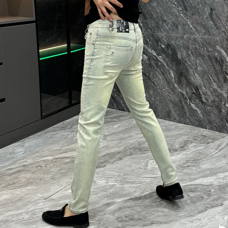 男士复古做旧牛仔裤秋季新款潮流修身小脚裤青年百搭休闲直筒男裤