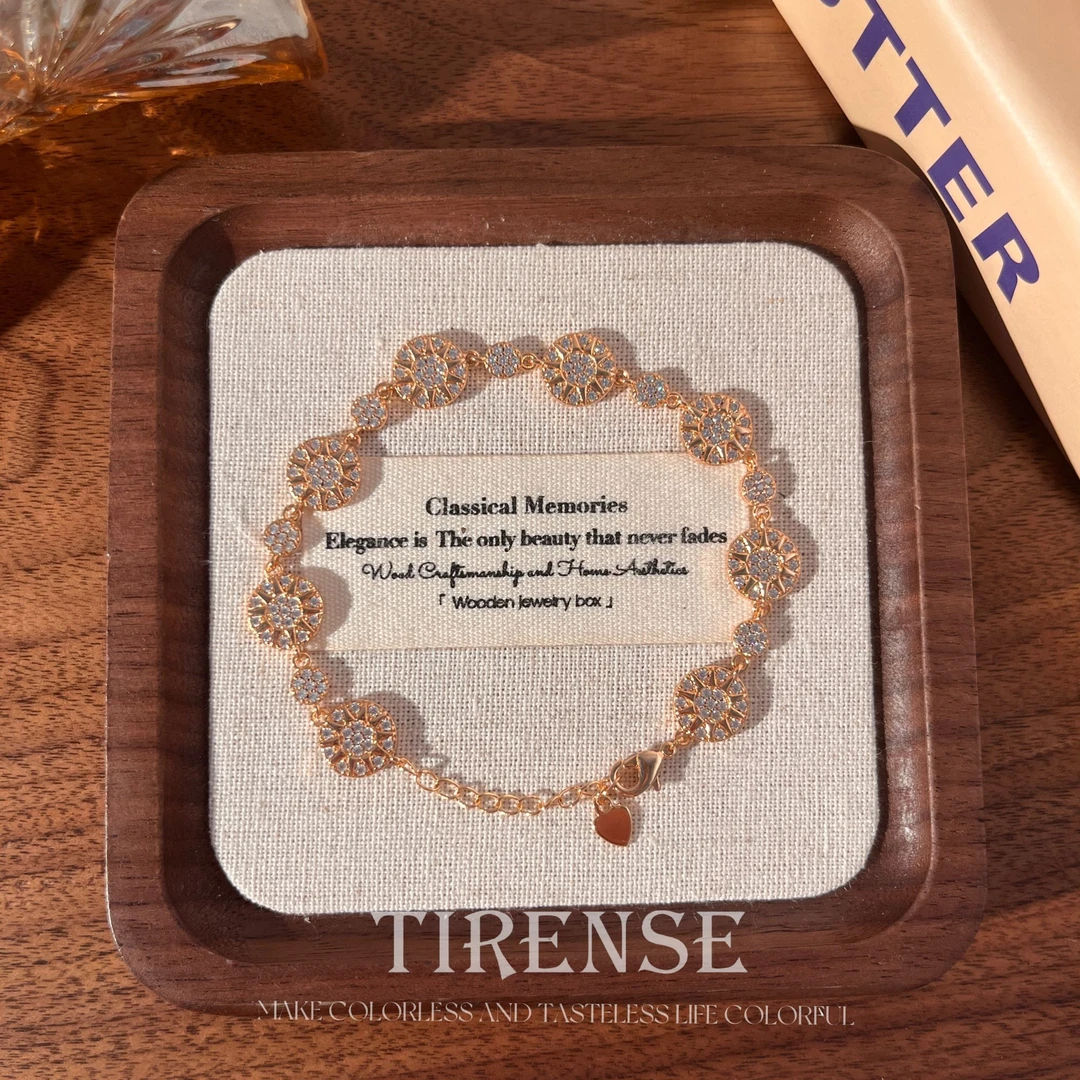 TIRENSE/狄伦斯 铜合金手链 镀18K金设计师款轻奢太阳花光芒手链