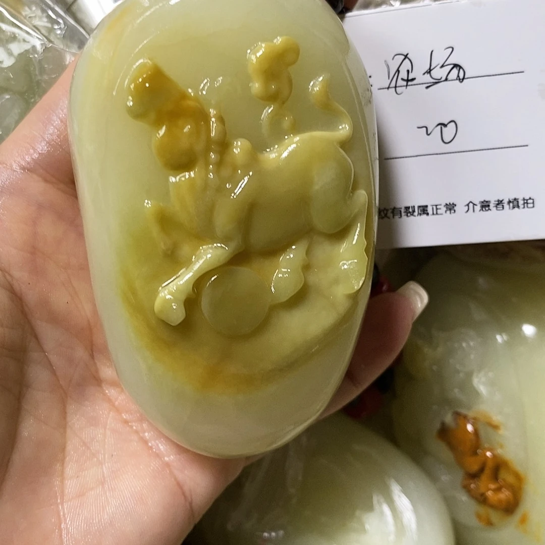 石材农**乐古青石手把件