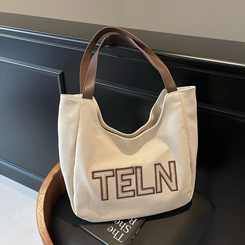 韩系托特包女2025秋冬新款简约时尚通勤单肩包大容量学生上课书包