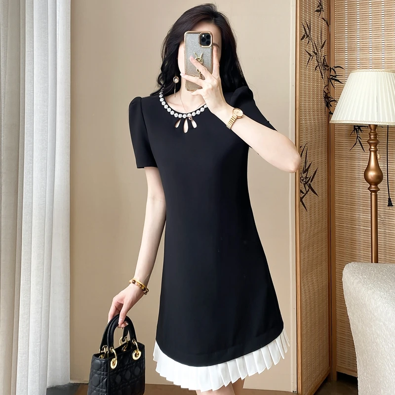 小个子连衣裙女夏2025新款法式设计感镂空小香风修身显瘦黑色裙子