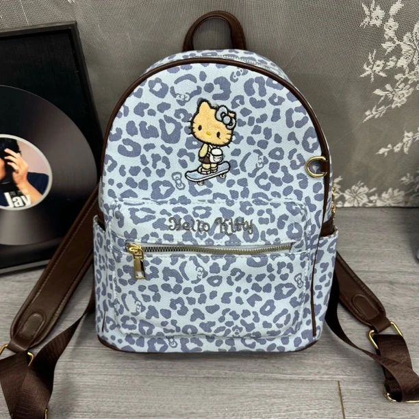 新款 豹纹可爱滑板猫大容量简约风中性时尚学生包双肩包