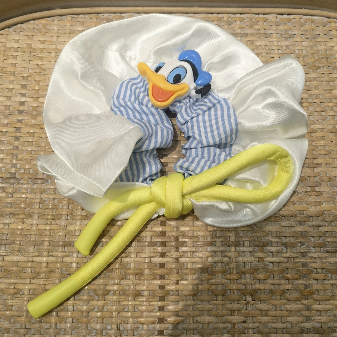 F720黄色鞋带唐老鸭条纹肠圈