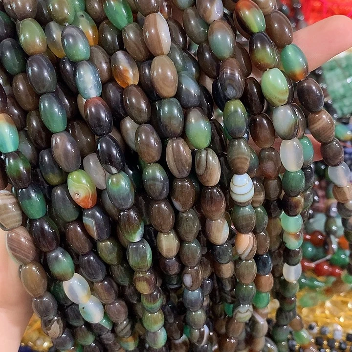 一条孔雀绿蚕丝米珠