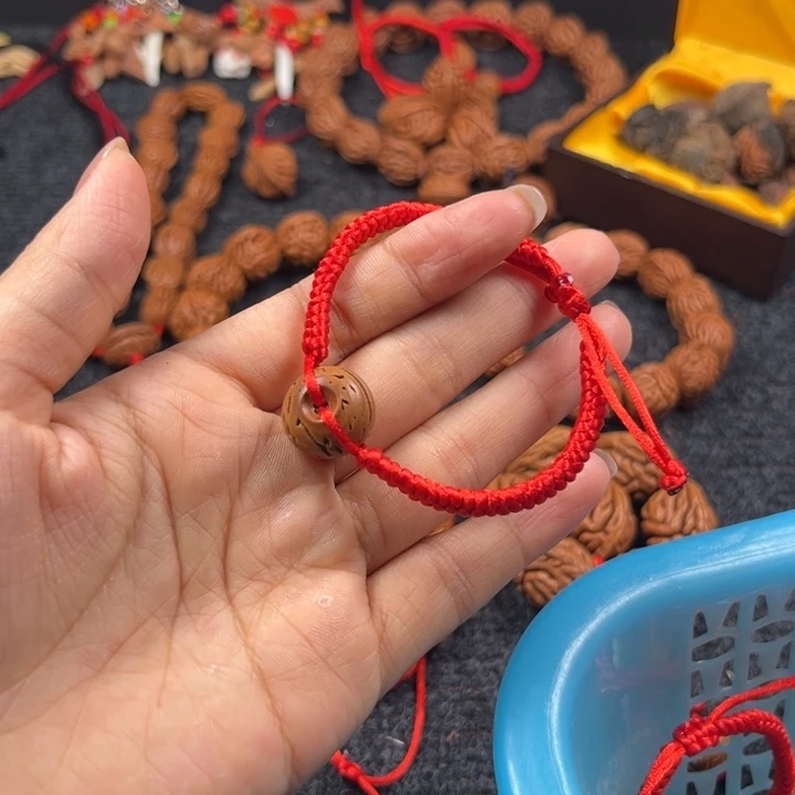 桃核吊坠@****万桃枭手链L7