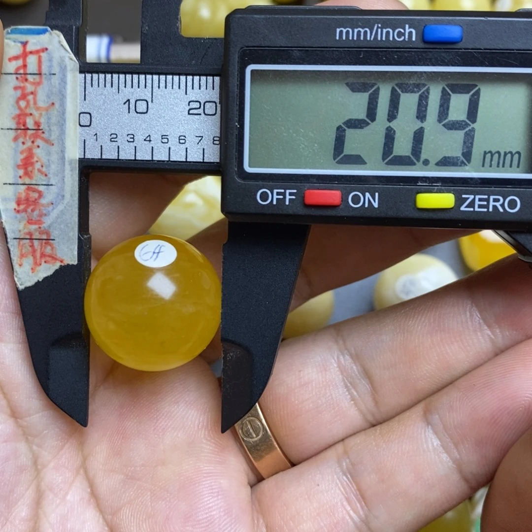 蜜蜡未镶嵌裸石20.9微瑕圆珠默认直发