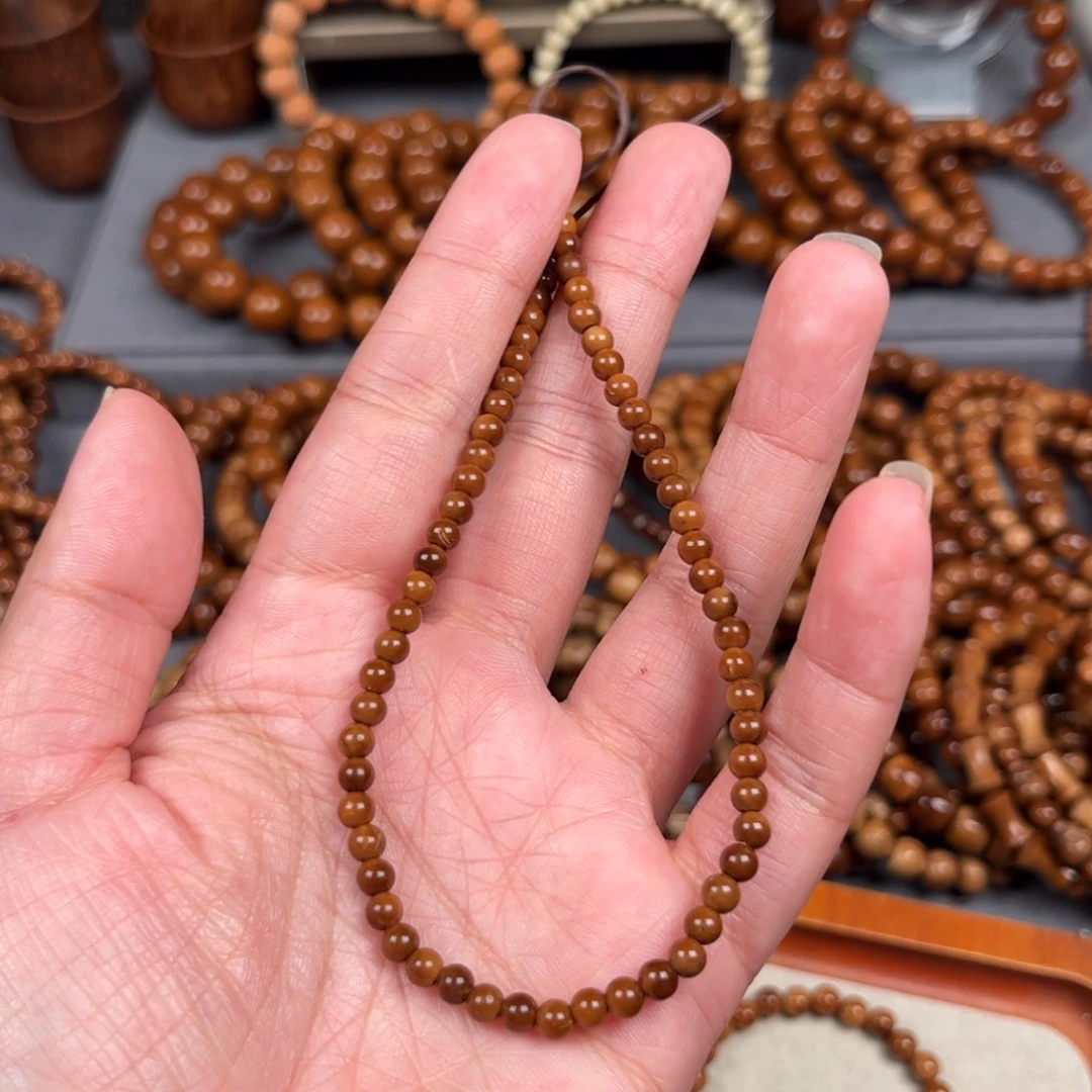 用***9果皮0.4圆珠单圈手串