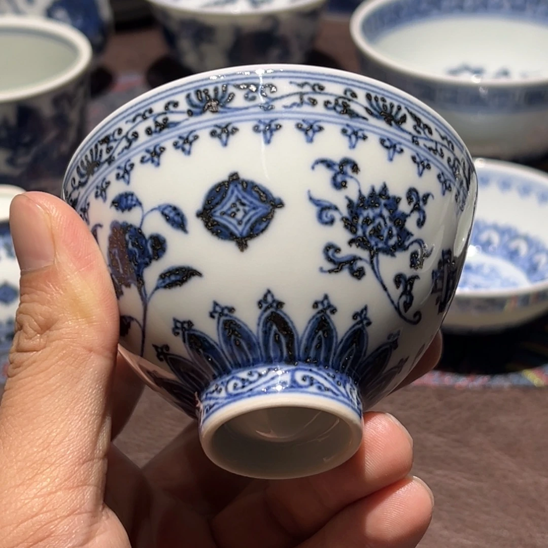精品青花杂宝内缠枝花卉鸡心杯口径约8.5厘米