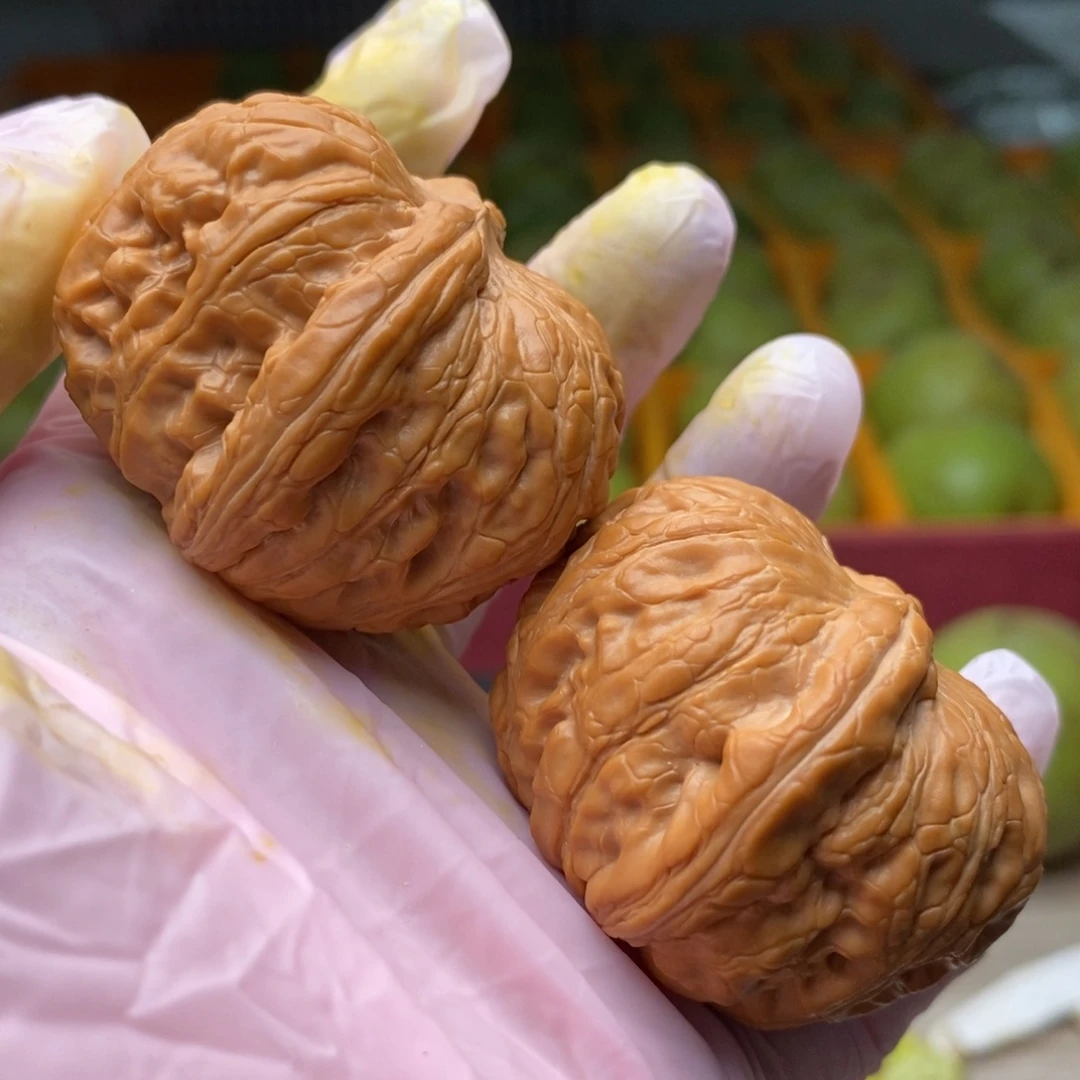 文玩核桃把件毕业大元宝