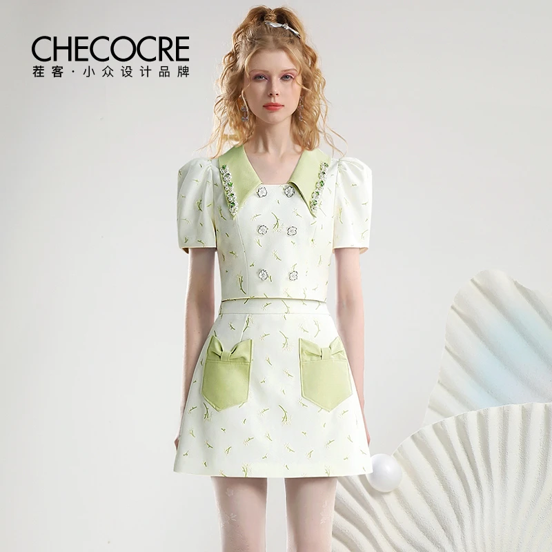 茬客甜美少女风套装裙蝴蝶结口袋珍珠链条绣花上衣短裙CM700563AB