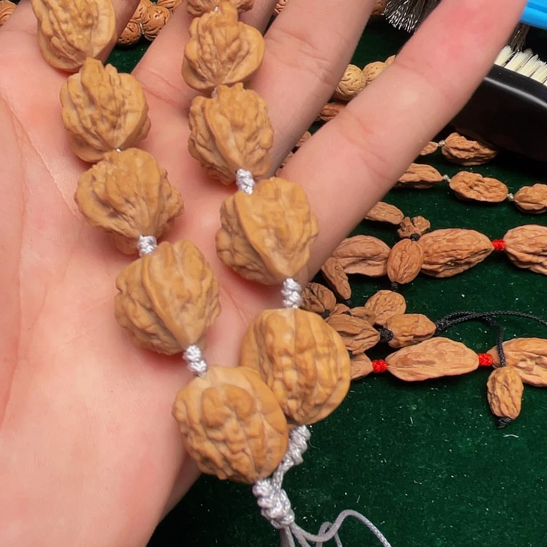 丁***海吊坠文玩核桃异性