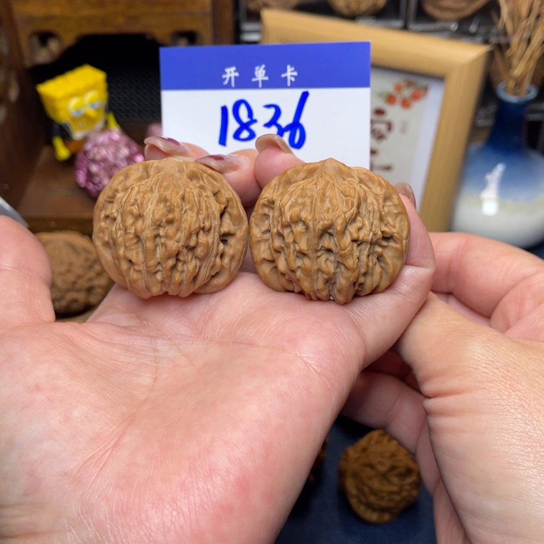 桃核把件平谷楼41李。全