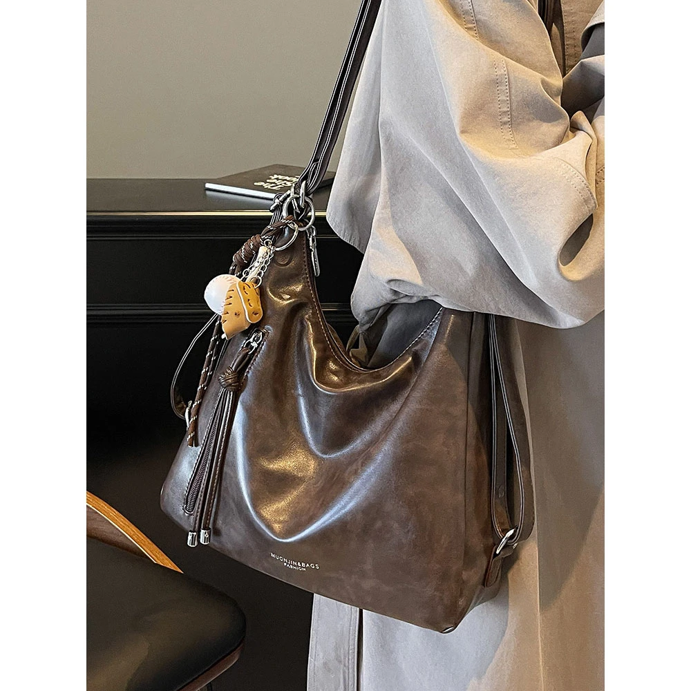 韩系小众设计斜跨包包女2025软皮腋下单肩托特包通勤简约双肩背包