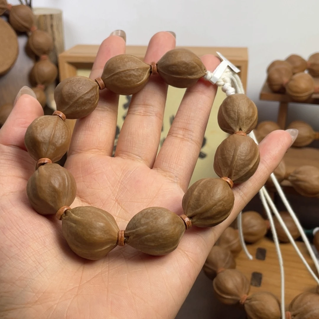 曾***梦橄榄核手串/手链20*25梅林铁核
