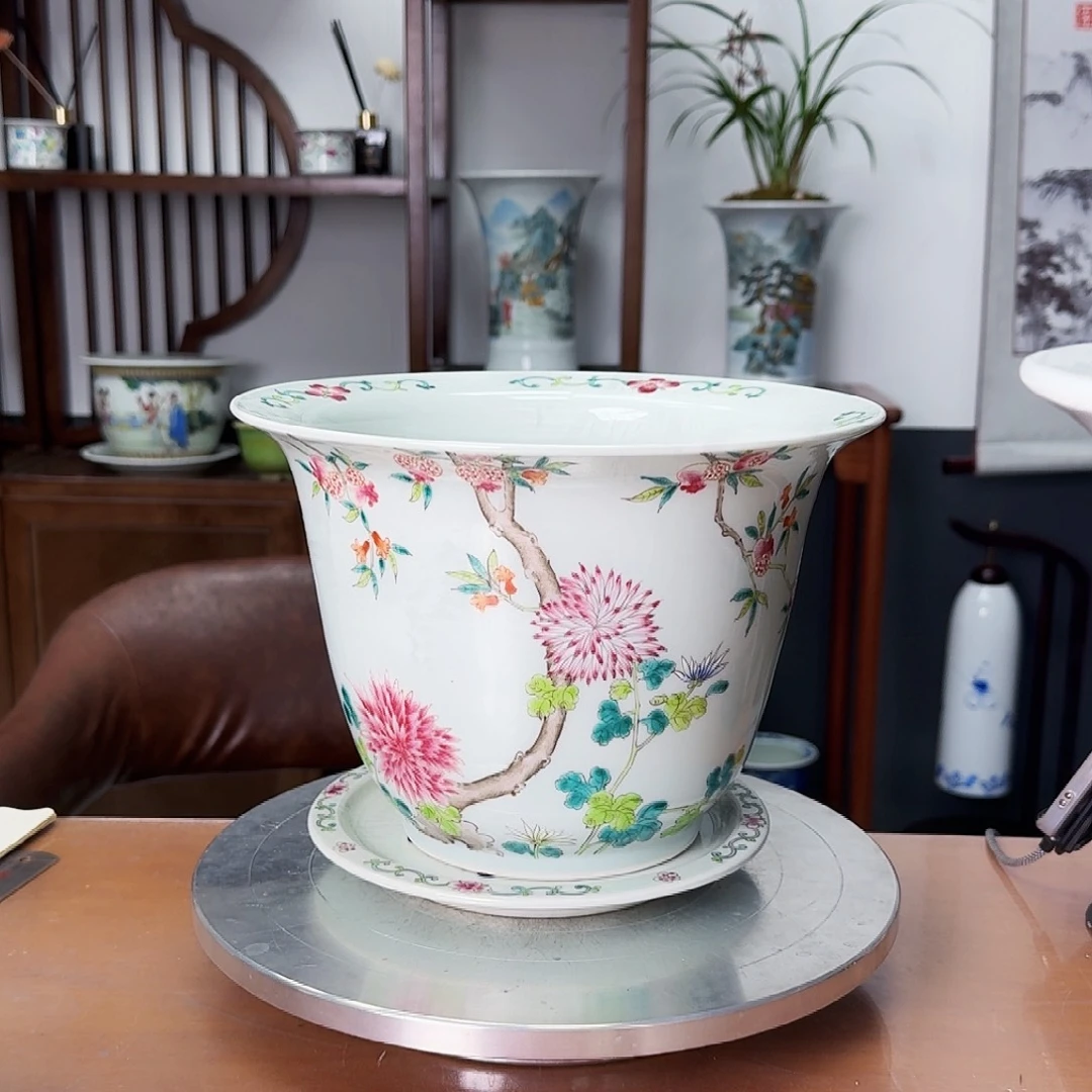 李***政粉彩金钟陶瓷盆8888