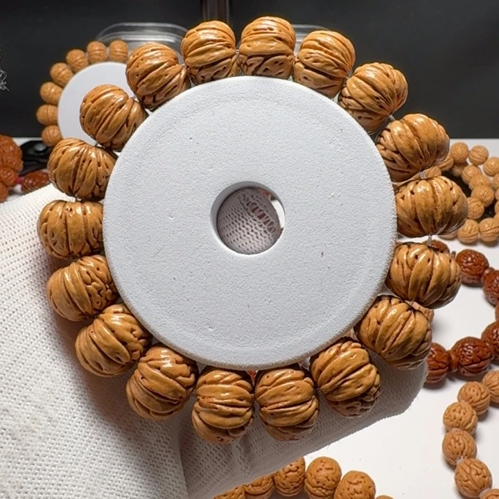 桃核手串微*树王肌肉纹纽扣