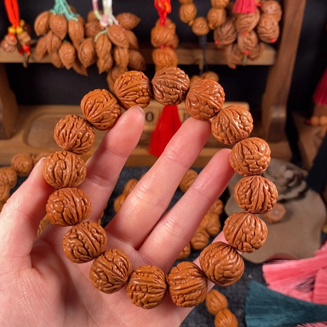 吊坠桃核桃枭手串