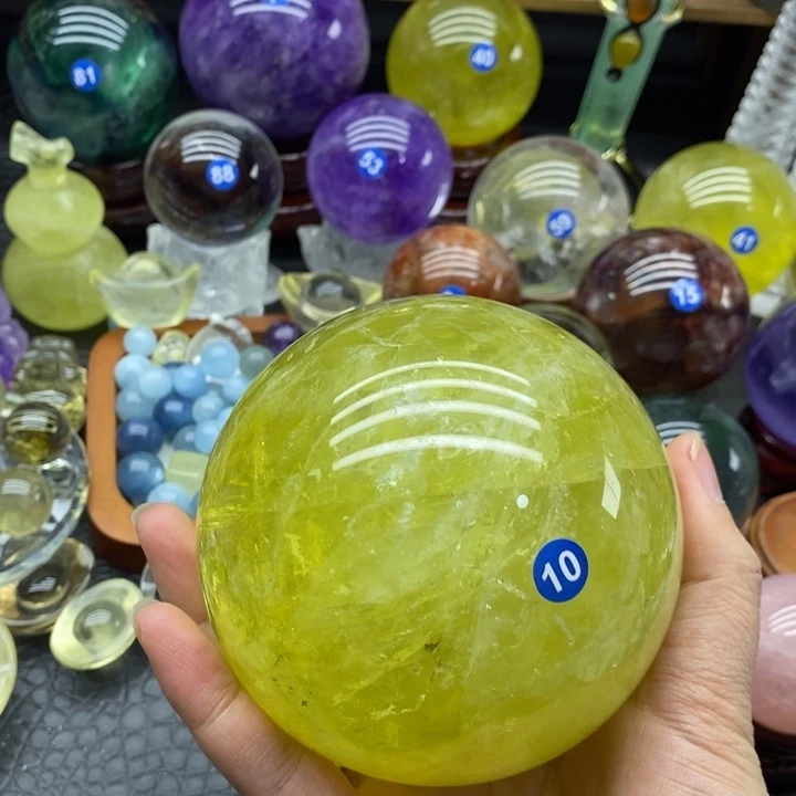 国***x石材天然黄水晶球