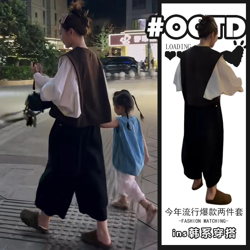 俏皮简约两件套女2025秋冬设计感撞色拼接假两件上衣黑色裤子