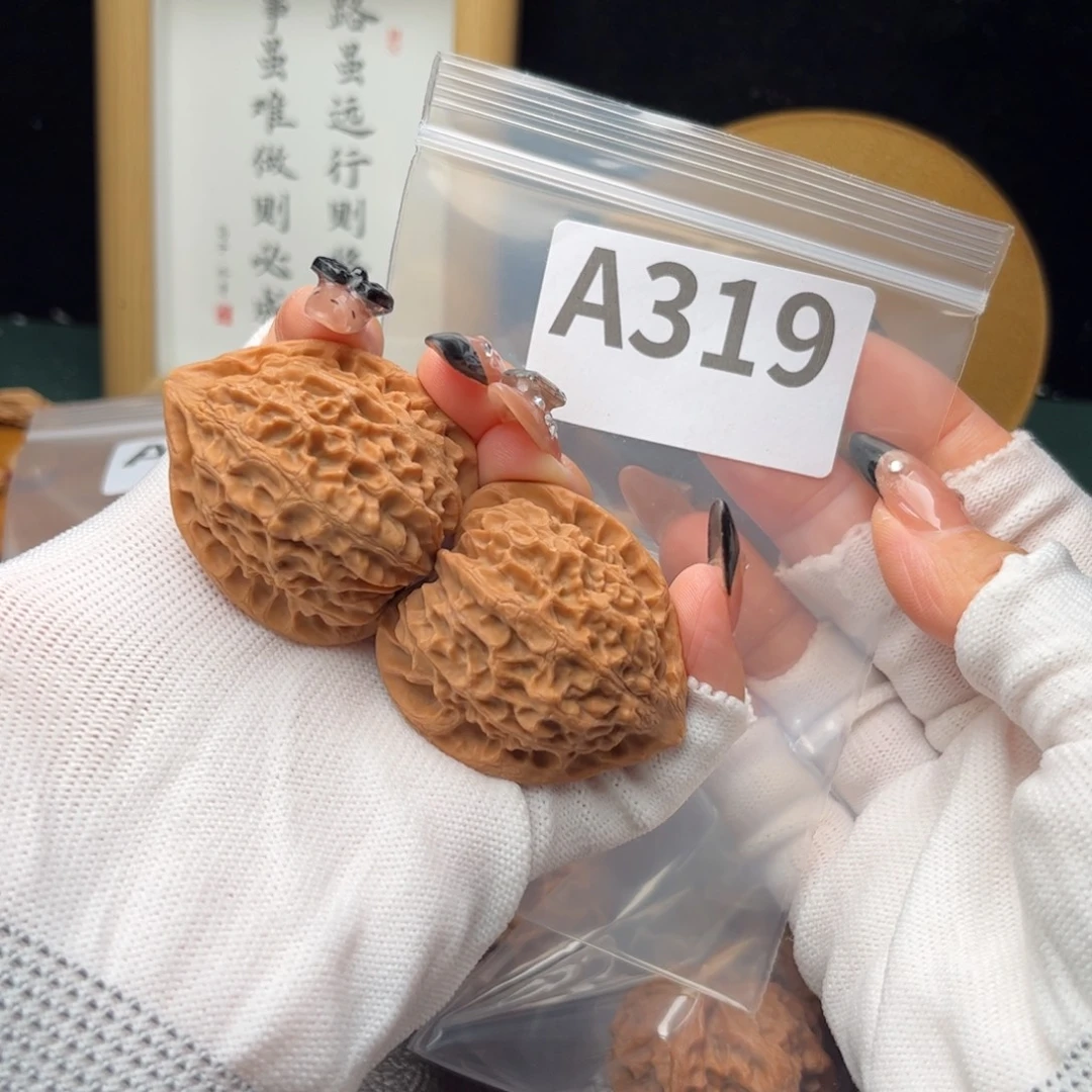 文玩核桃把件40金牛a319