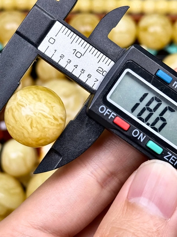 18.6mm俄料国矿一级料浓瓷白妖孽虎皮纹千层雪橘底金溶洞蜜蜡圆珠