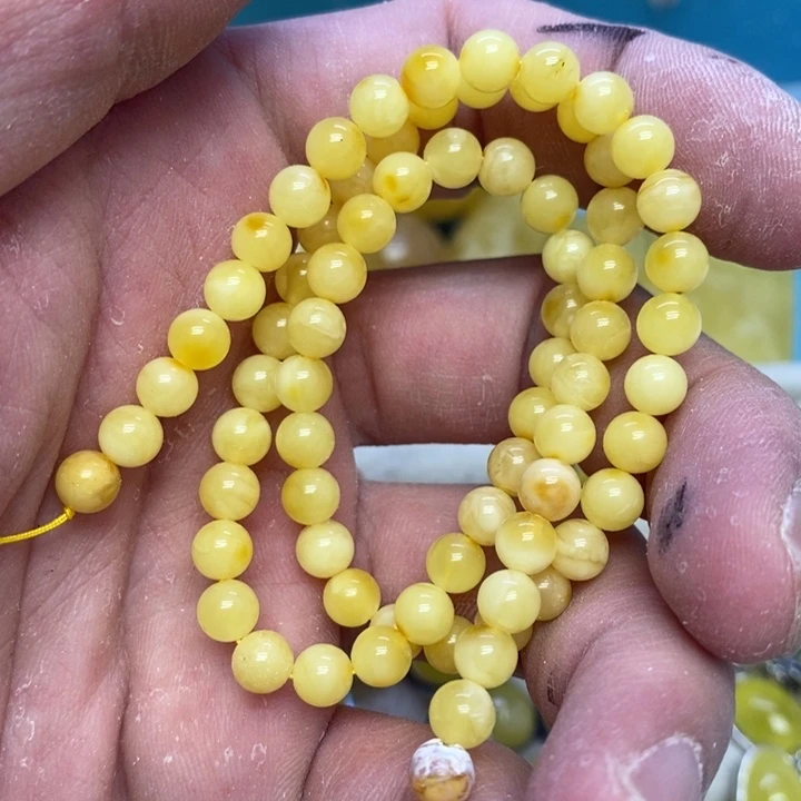 蜜蜡裸石未镶嵌串